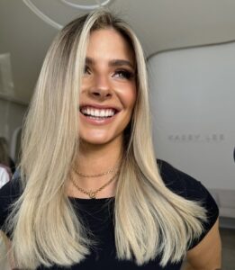 Front view of face-framing blonde hair, highlighting our professional hair service.